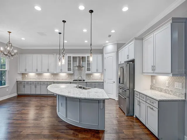 a view of a entryway door with wooden floor
