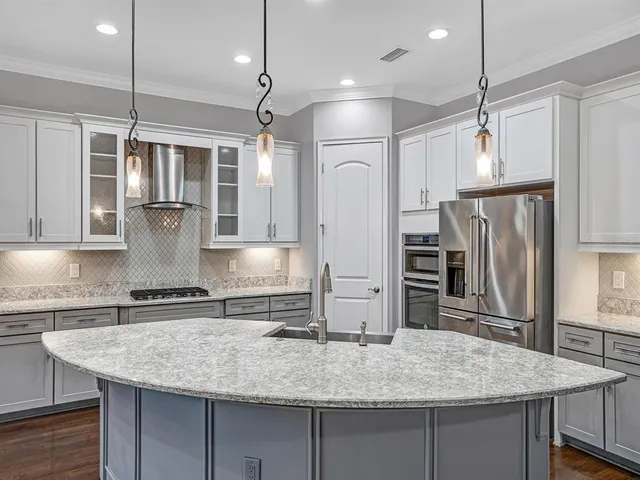 a view of a porch with a table and chairs