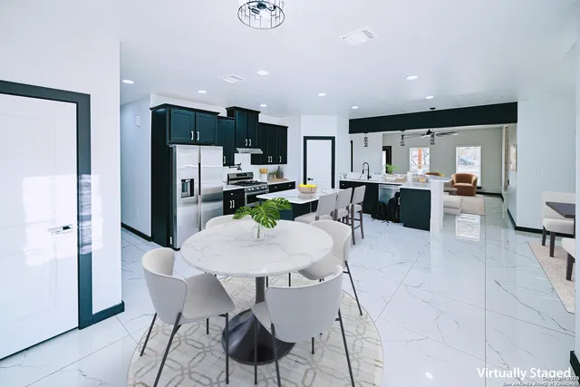 a view of a dining room with furniture