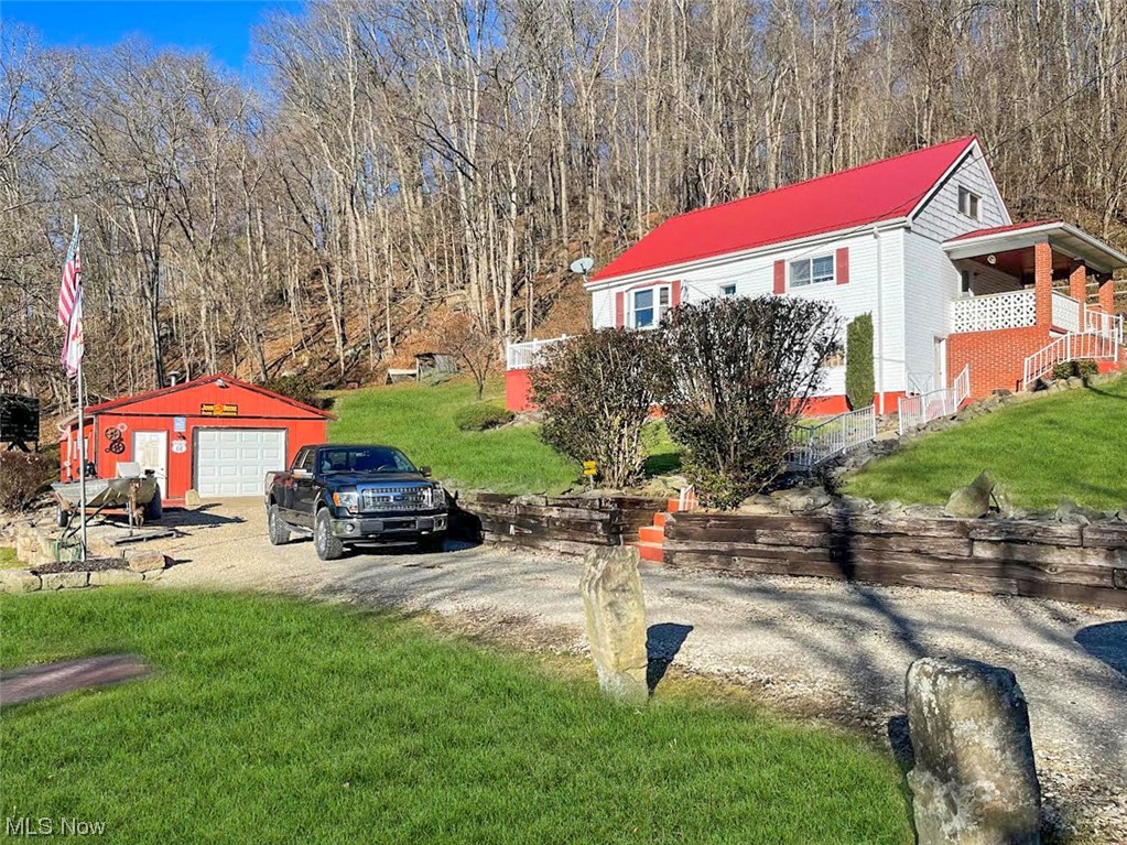 832 Cross Creek Road Colliers, WV 26035 - Photo 1 of 22 View of yard with a garage