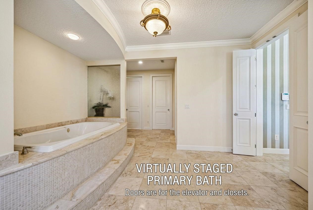 39 Marsh Creek Road Fernandina Beach, FL 32034 - Photo 28 of 78 a bathroom with a bathtub and a shower