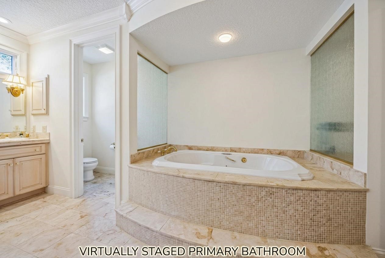 39 Marsh Creek Road Fernandina Beach, FL 32034 - Photo 29 of 78 a en suite bathroom with a granite countertop sink a toilet and shower