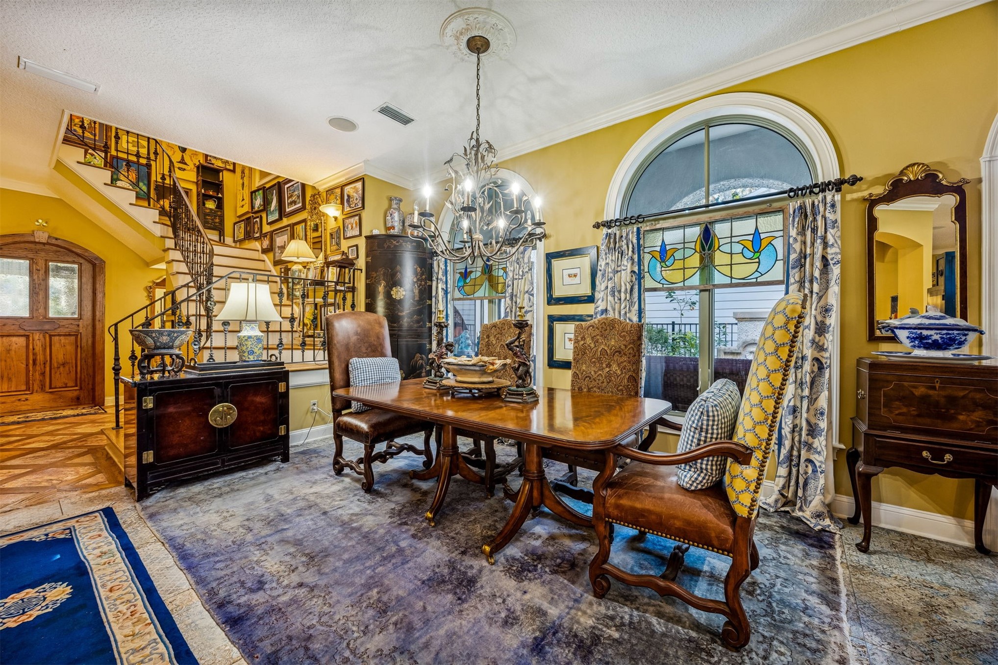 39 Marsh Creek Road Fernandina Beach, FL 32034 - Photo 42 of 78 a view of a dining room with furniture and chandelier