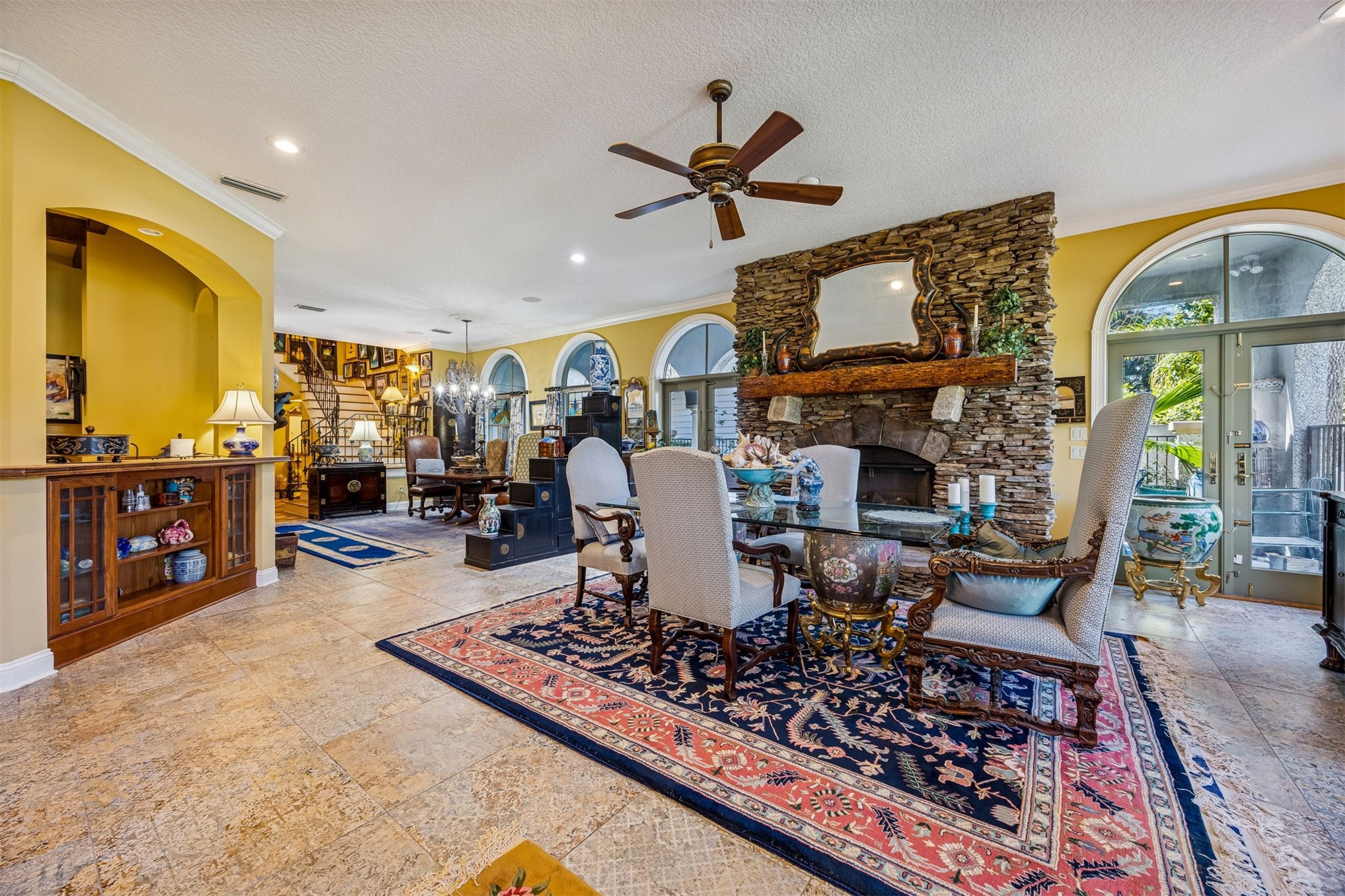 39 Marsh Creek Road Fernandina Beach, FL 32034 - Photo 44 of 78 a living room with lots of furniture and a chandelier