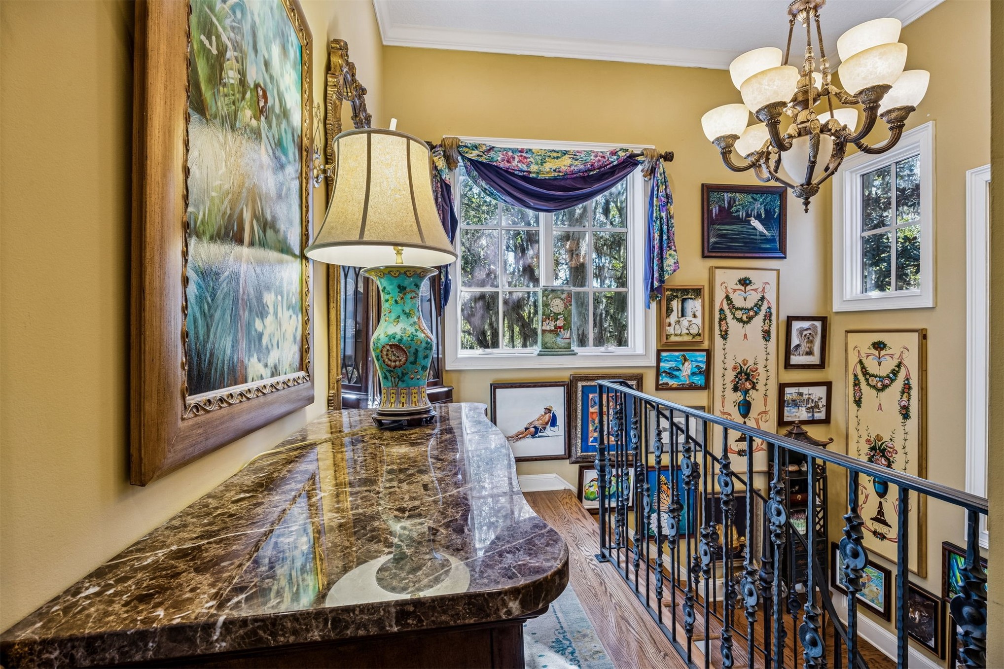 39 Marsh Creek Road Fernandina Beach, FL 32034 - Photo 61 of 78 a view of a dining room with furniture chandelier and wooden floor