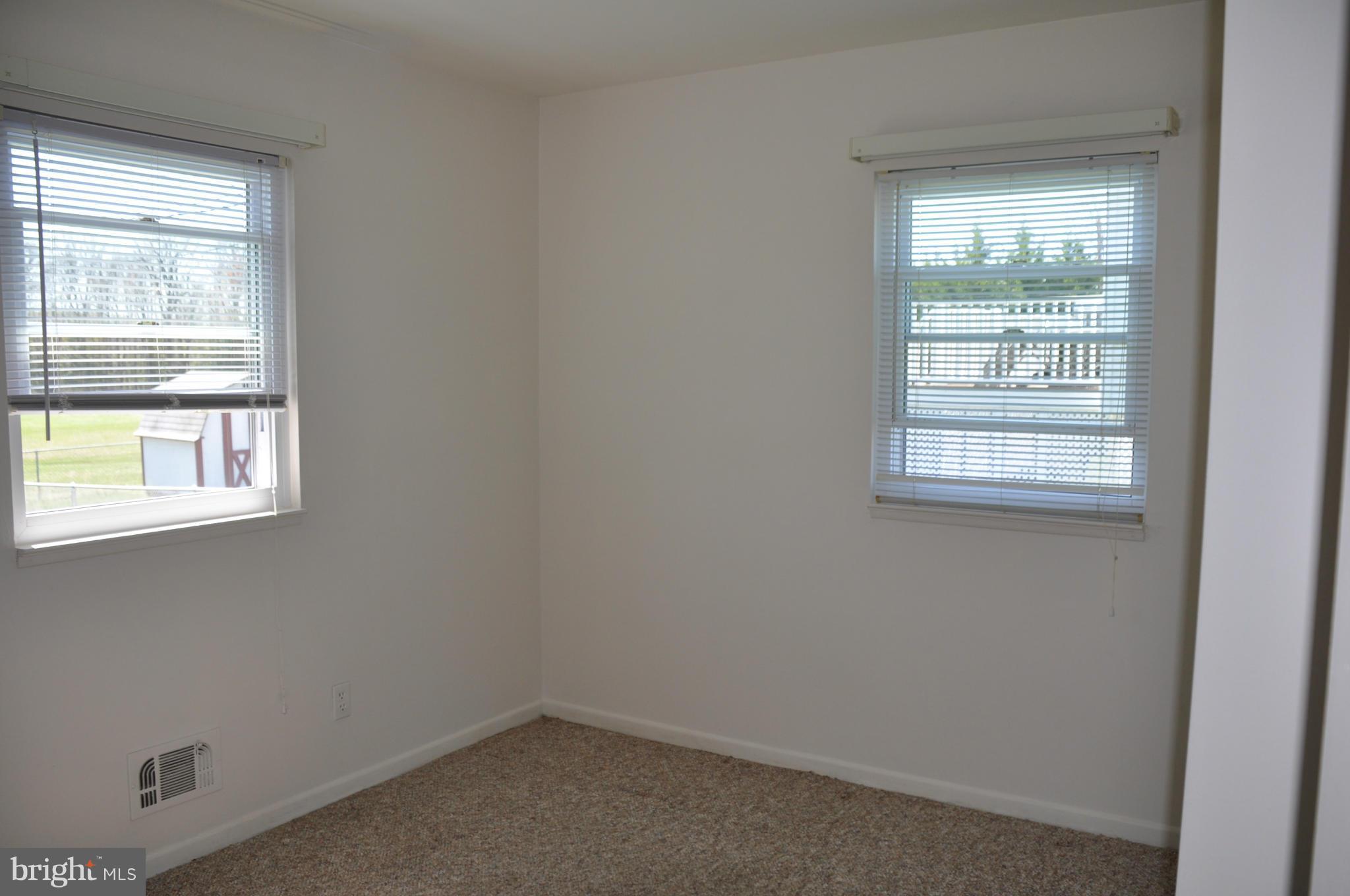 3837 Bayville Road Baltimore, MD 21220 - Photo 8 of 14 an empty room with a window