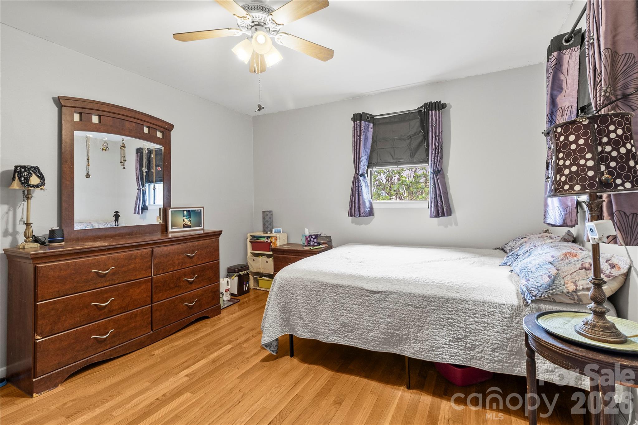 325 Swanson Road Lenoir, NC 28645 - Photo 24 of 35 a bedroom with a bed and a dresser