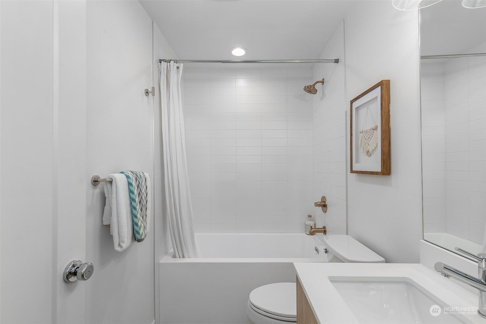 930 Northwest 56th Street Seattle, WA 98107 - Photo 18 of 35 a bathroom with a toilet and a shower