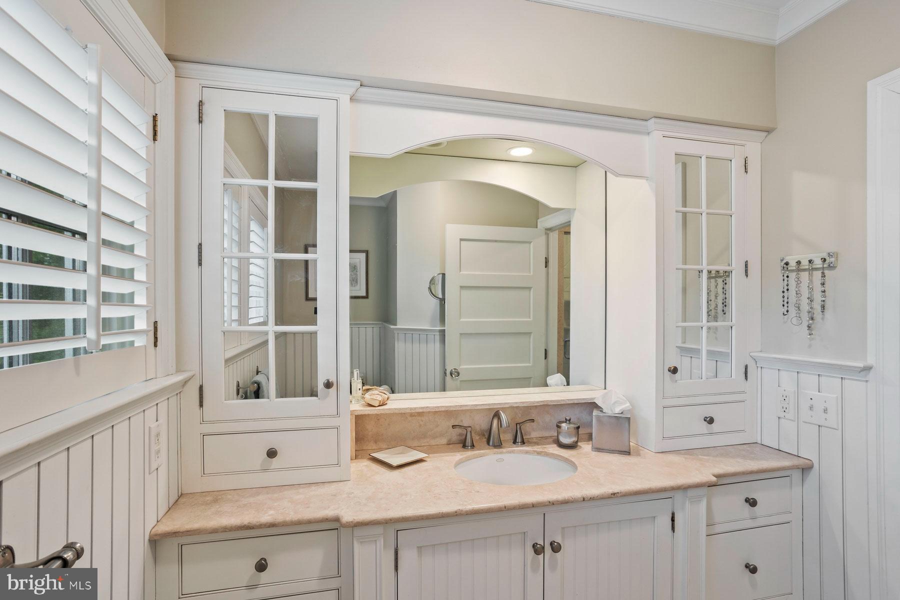 261 Forrest Road Merion Station, PA 19066 - Photo 21 of 43 a bathroom with a sink and a mirror