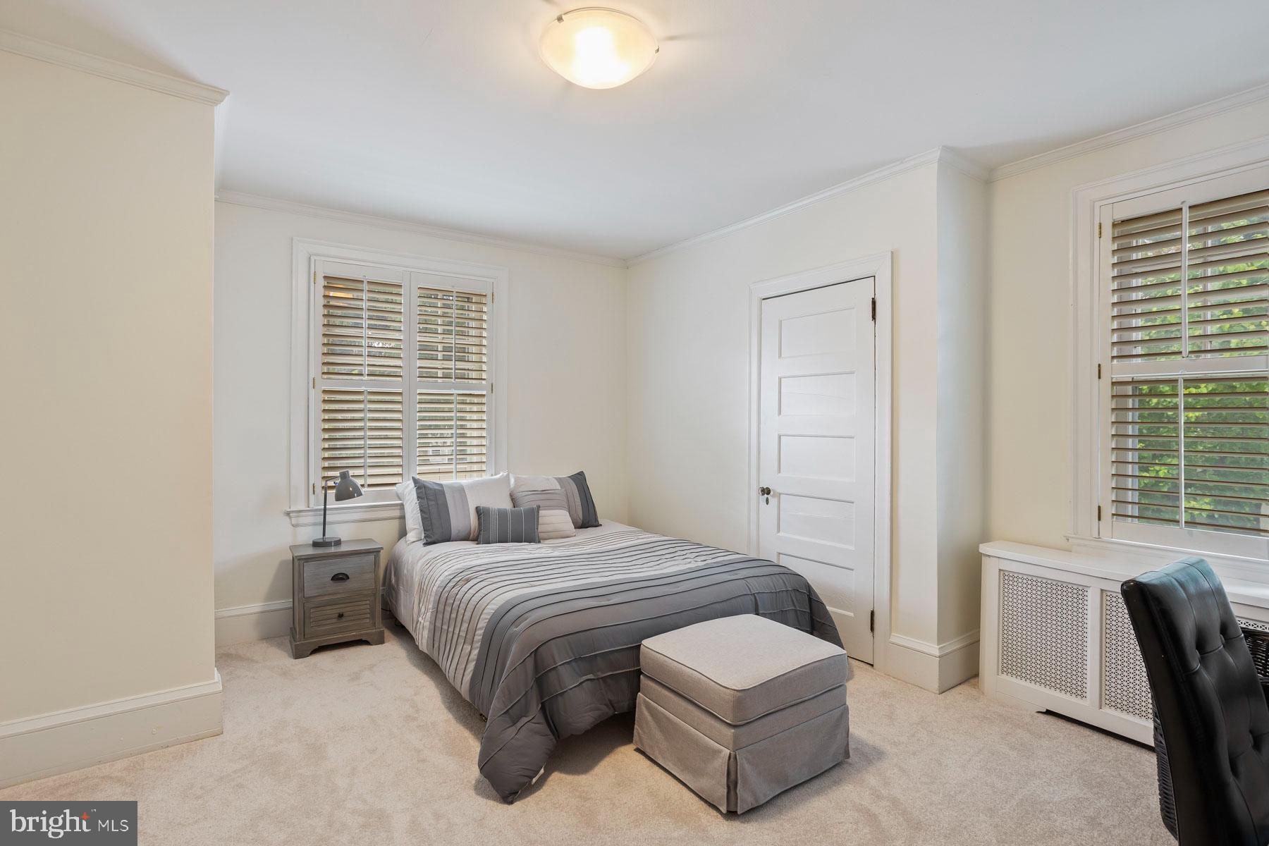 261 Forrest Road Merion Station, PA 19066 - Photo 27 of 43 a bedroom with a bed and a window