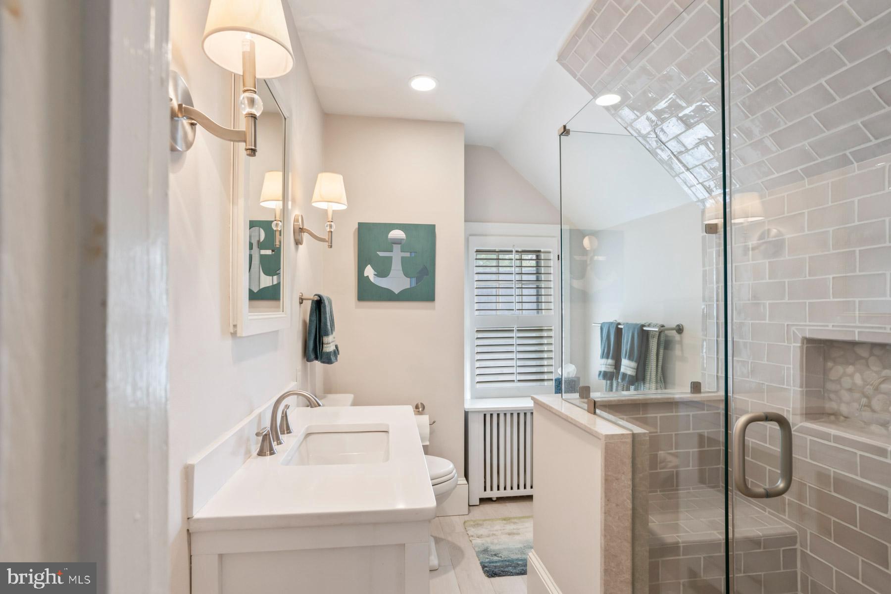 261 Forrest Road Merion Station, PA 19066 - Photo 29 of 43 a bathroom with a sink a toilet and shower