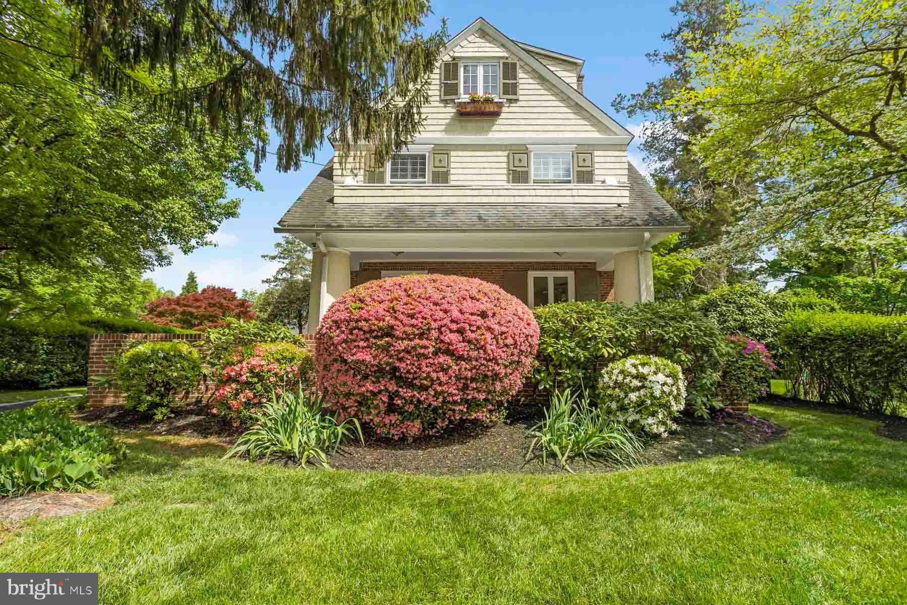 261 Forrest Road Merion Station, PA 19066 - Photo 37 of 43 a front view of a house with a garden