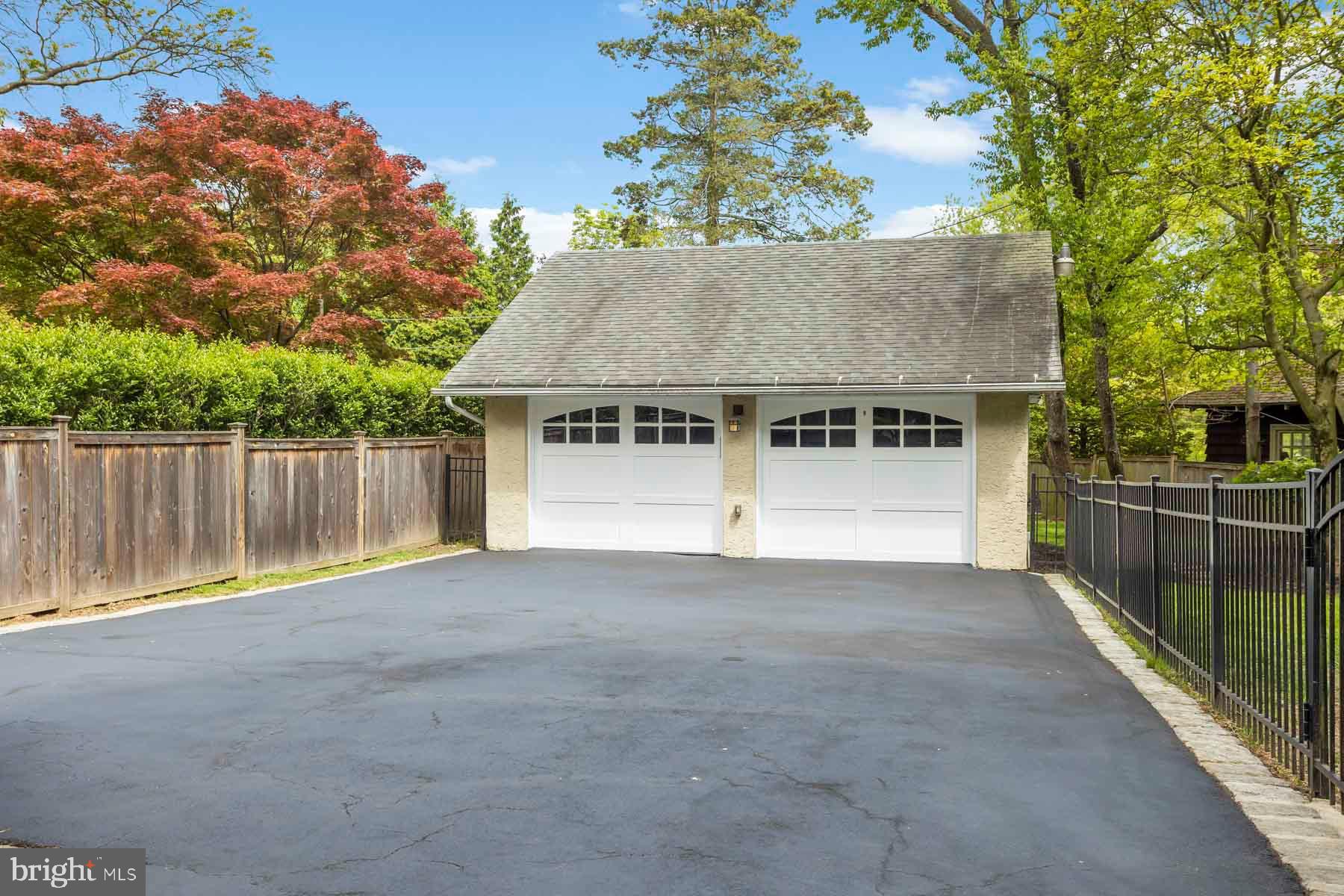261 Forrest Road Merion Station, PA 19066 - Photo 43 of 43 a view of backyard with small cabin and wooden fence