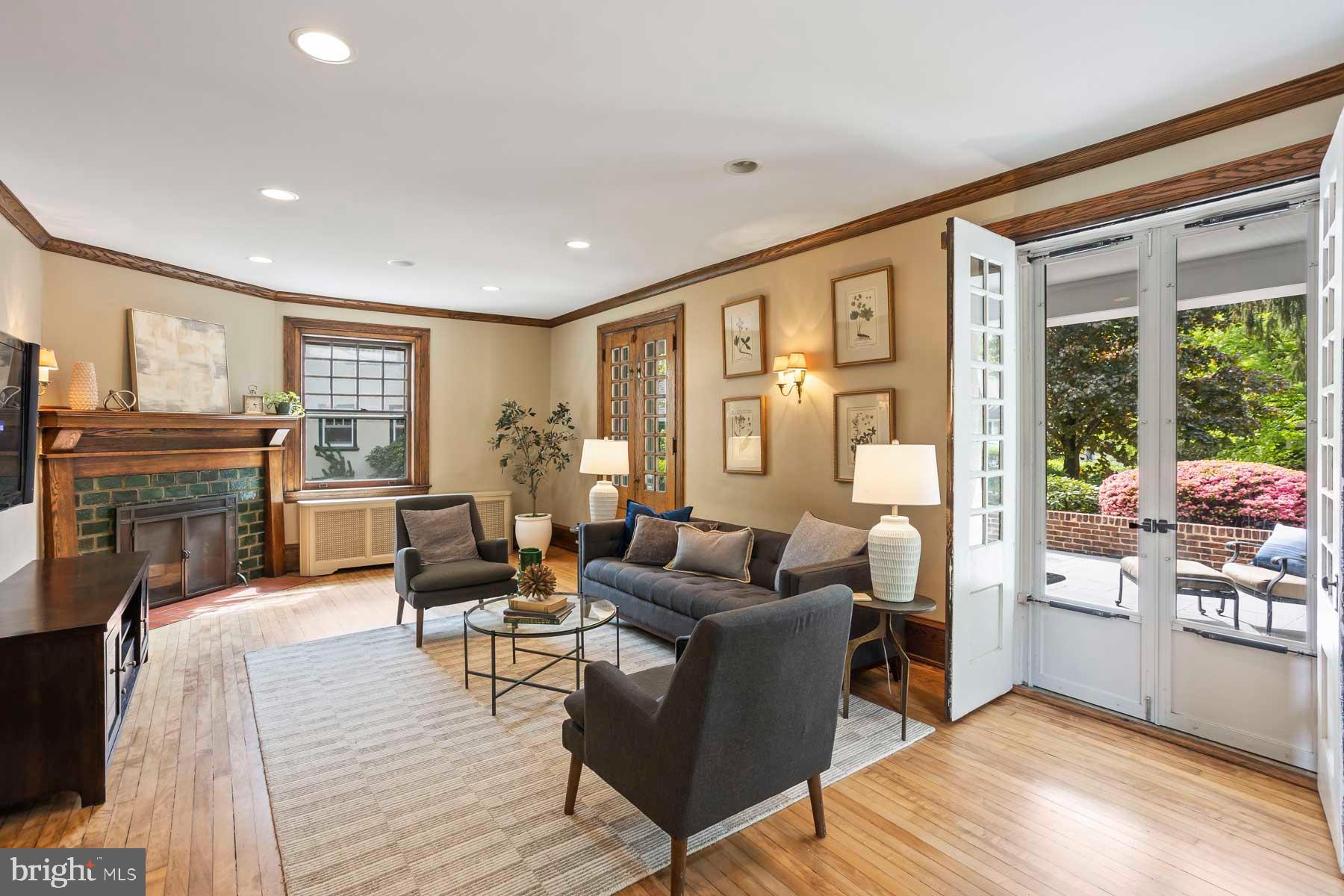 261 Forrest Road Merion Station, PA 19066 - Photo 5 of 43 a living room with furniture and a floor to ceiling window