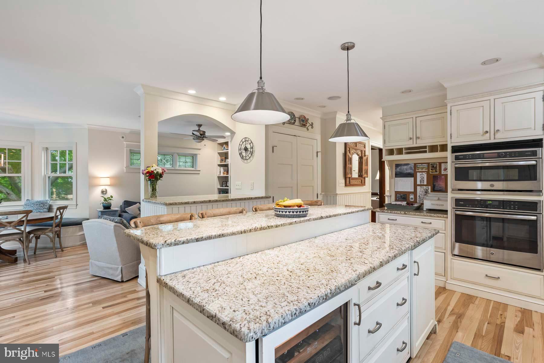 261 Forrest Road Merion Station, PA 19066 - Photo 8 of 43 a kitchen with stainless steel appliances granite countertop stove top oven and cabinets