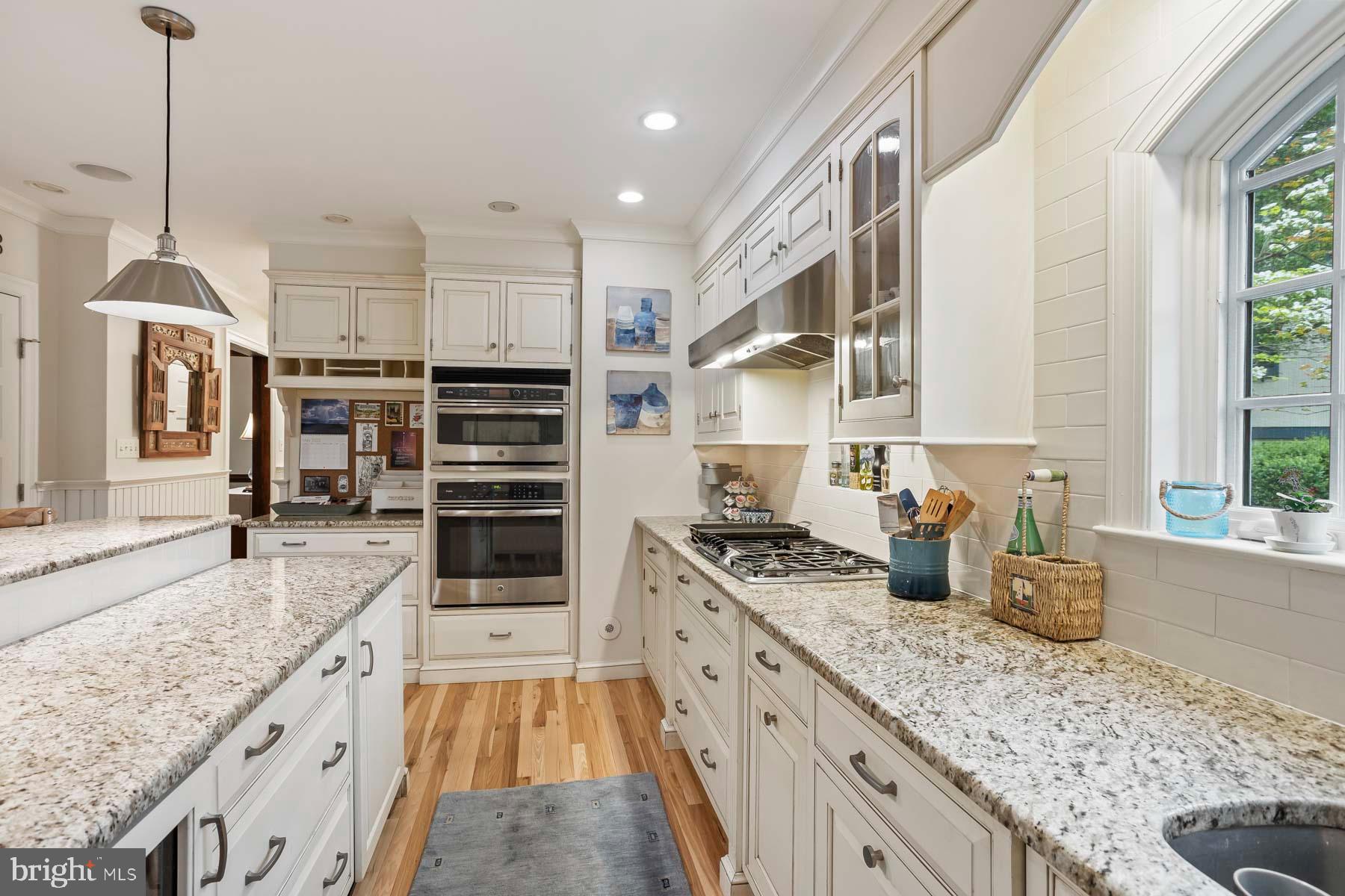261 Forrest Road Merion Station, PA 19066 - Photo 9 of 43 a kitchen with stainless steel appliances granite countertop a stove oven and a sink