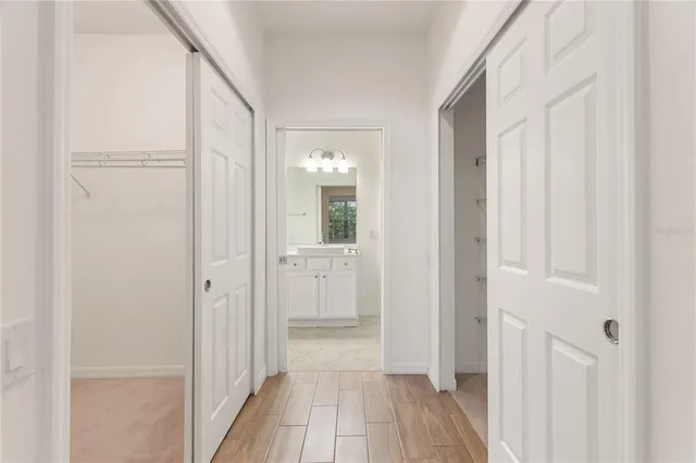 a view of a bathroom from the hallway