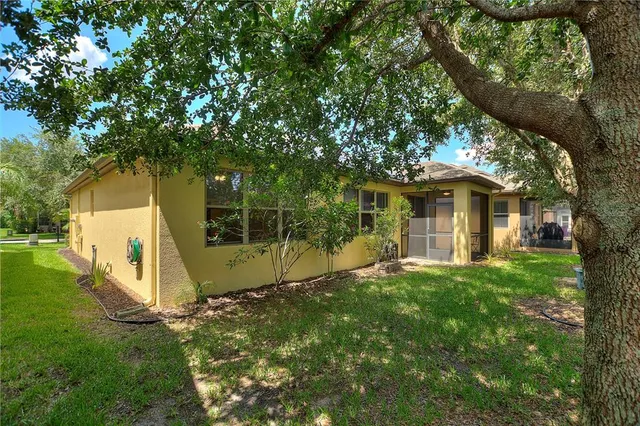 a view of a back yard of the house