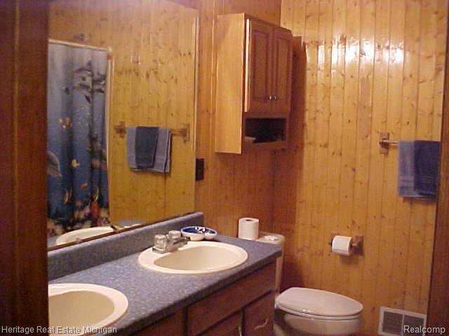 7604 Hayner Road Fowlerville, MI 48836 - Photo 8 of 10 Master Bath Double Bowl Vanities - Ceramic Flooring