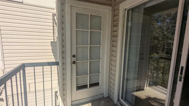 a view of swimming pool with a patio