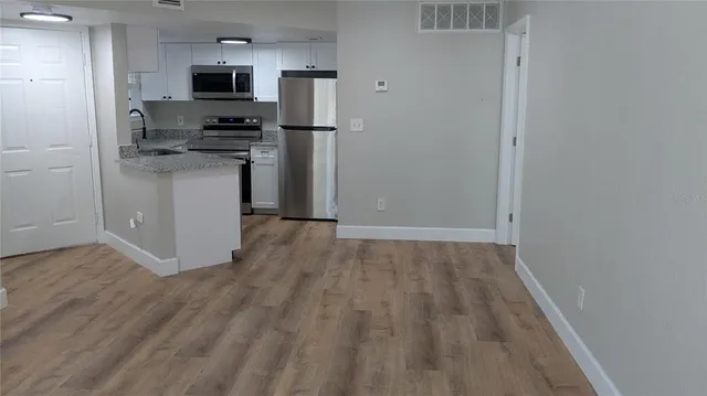 a view of a room with a window