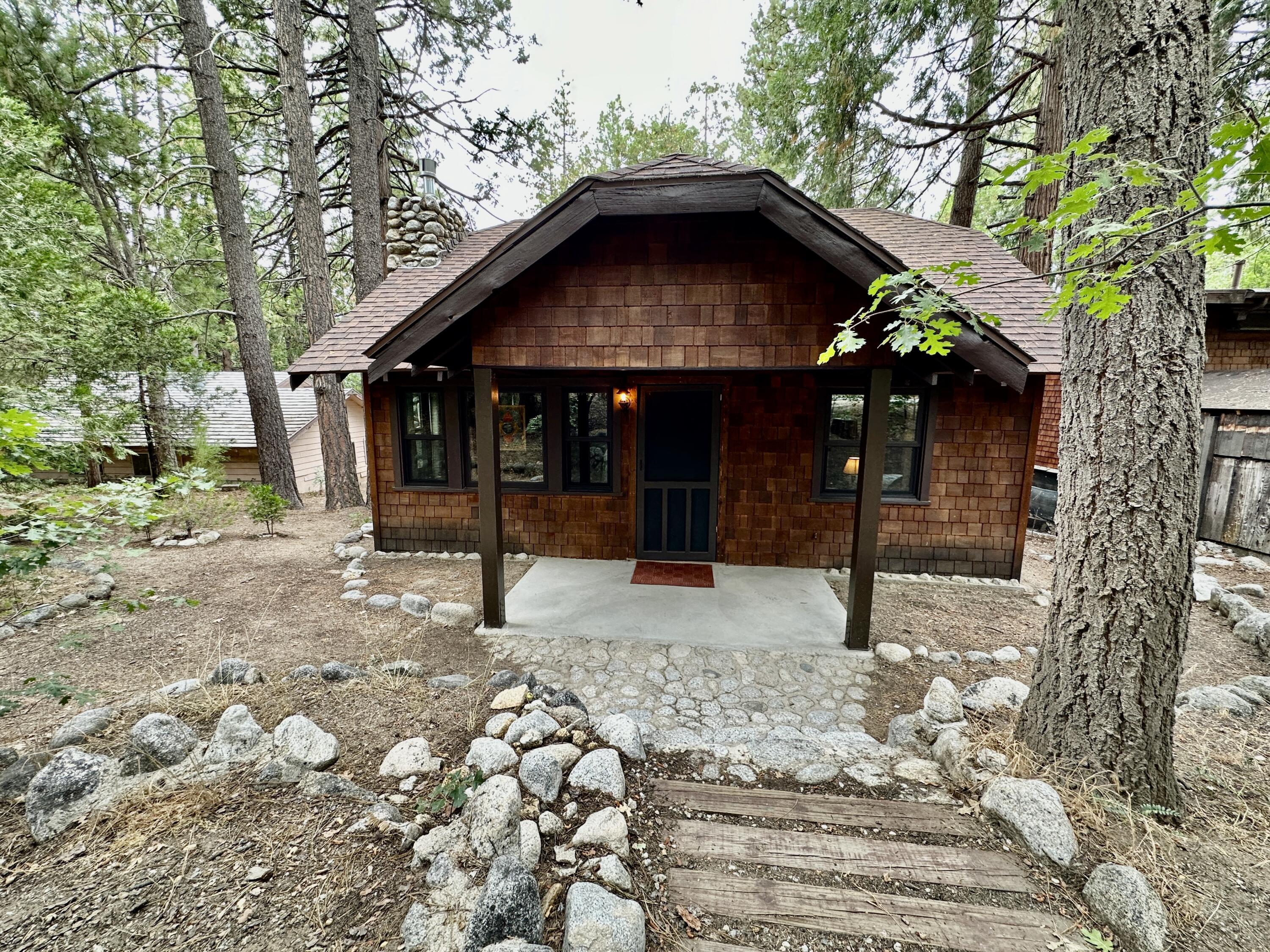 53765 Idyllwild Road Idyllwild, CA 92549 - Photo 1 of 43 a view of a house with a yard