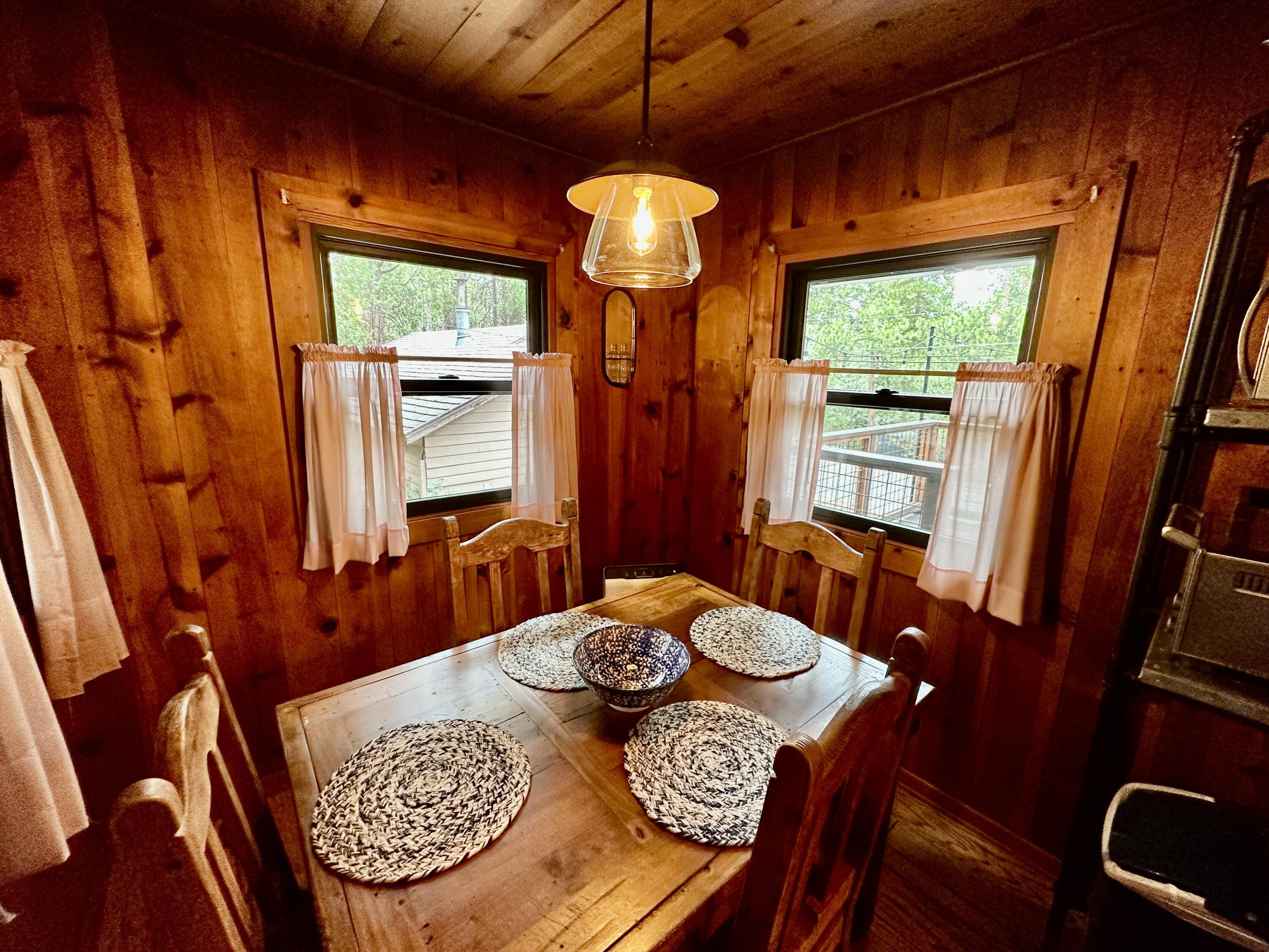 53765 Idyllwild Road Idyllwild, CA 92549 - Photo 14 of 43 a dining room with furniture and window