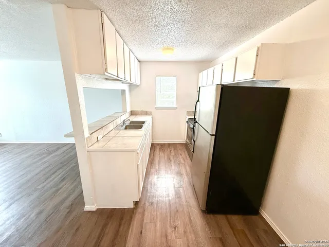 a utility room with washer and dryer