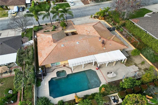 an aerial view of a house with outdoor space