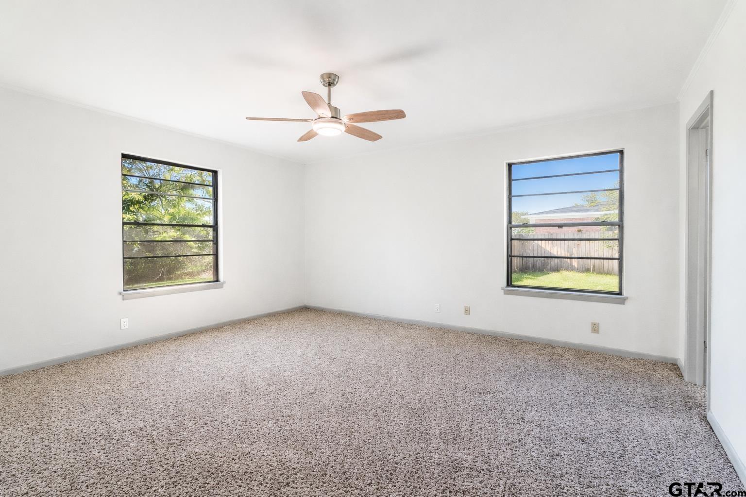 2419 Pounds Avenue Tyler, TX 75701 - Photo 31 of 48 a view of an empty room with a window