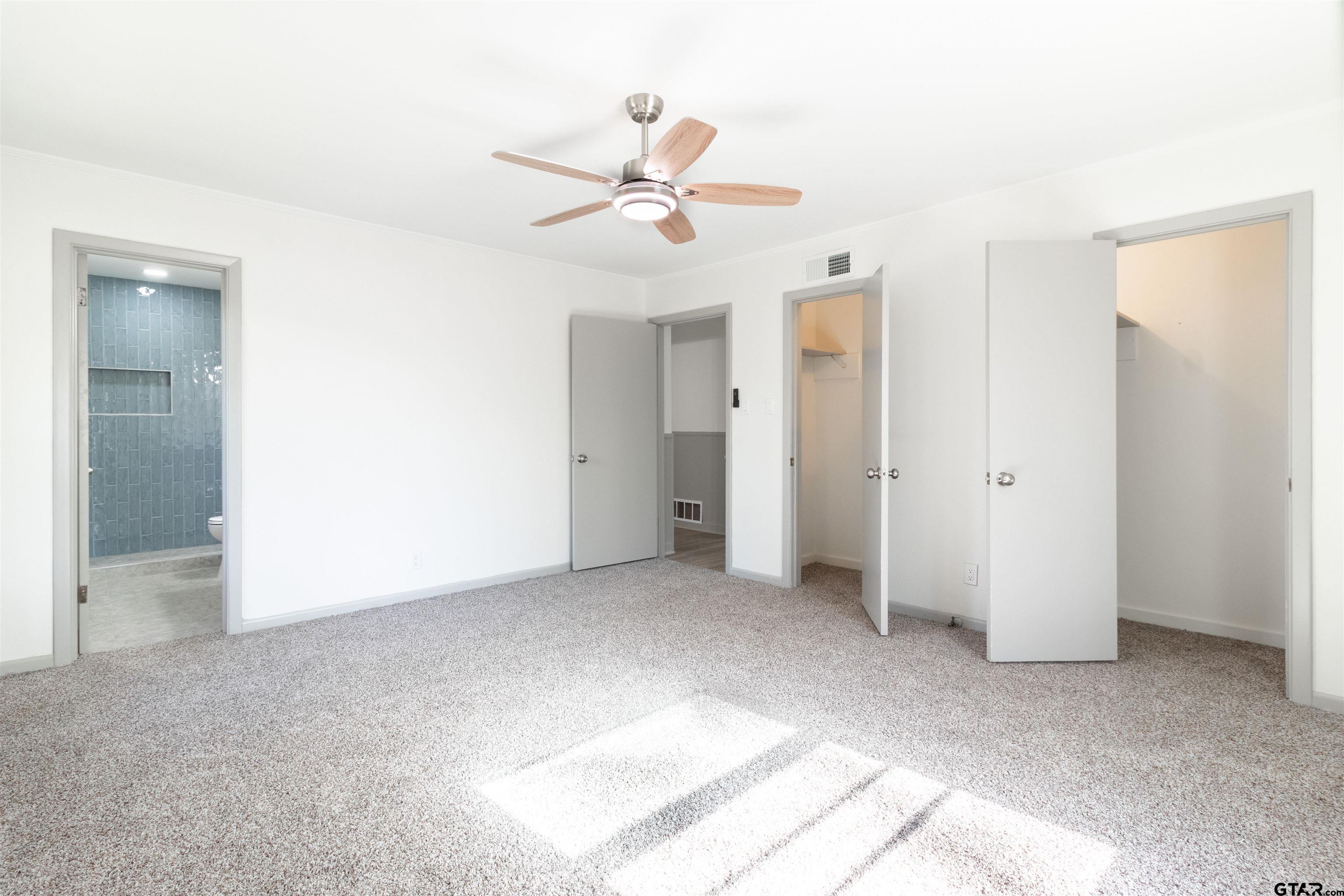 2419 Pounds Avenue Tyler, TX 75701 - Photo 33 of 48 an empty room with closet and fan
