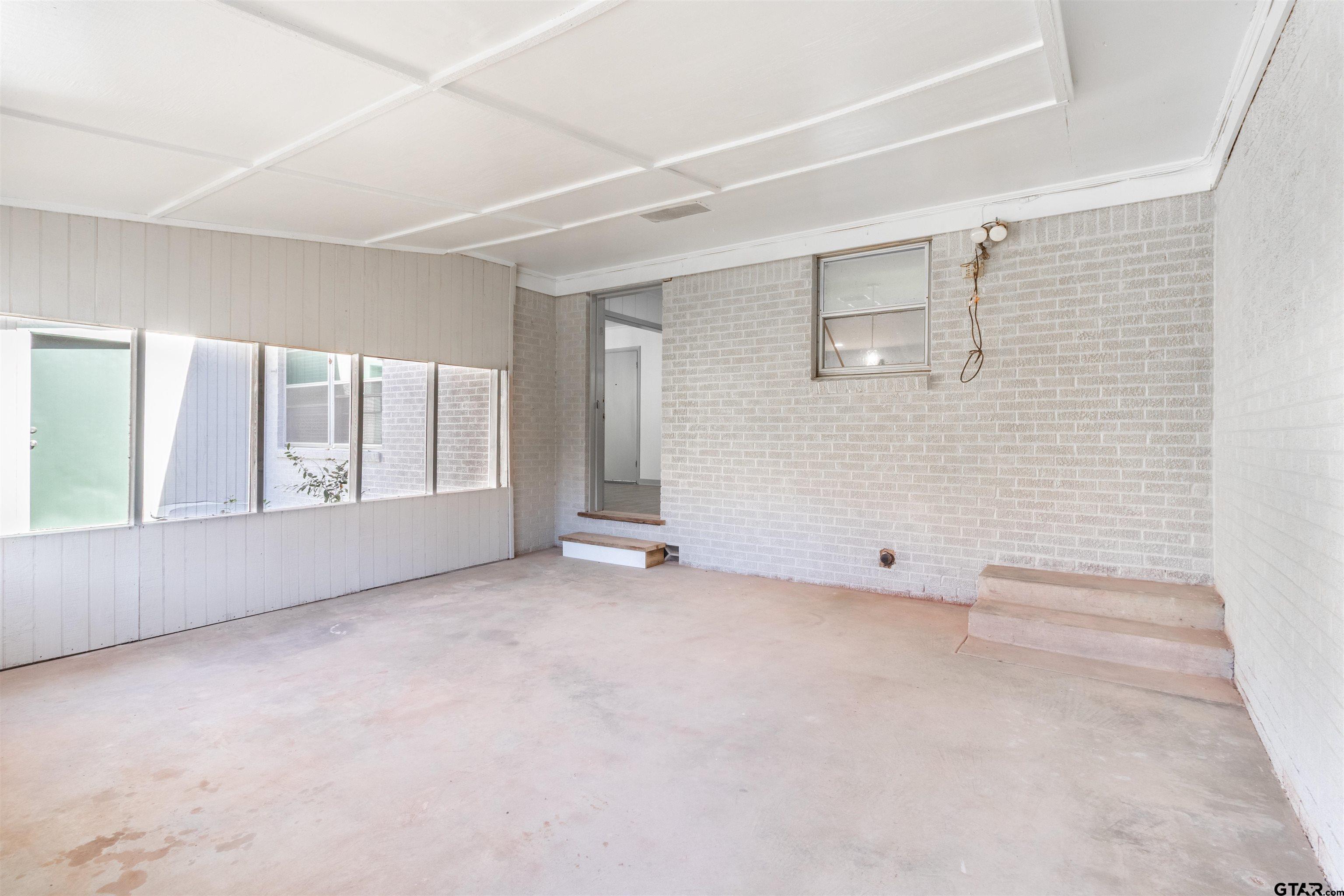 2419 Pounds Avenue Tyler, TX 75701 - Photo 37 of 48 a view of an empty room with a window