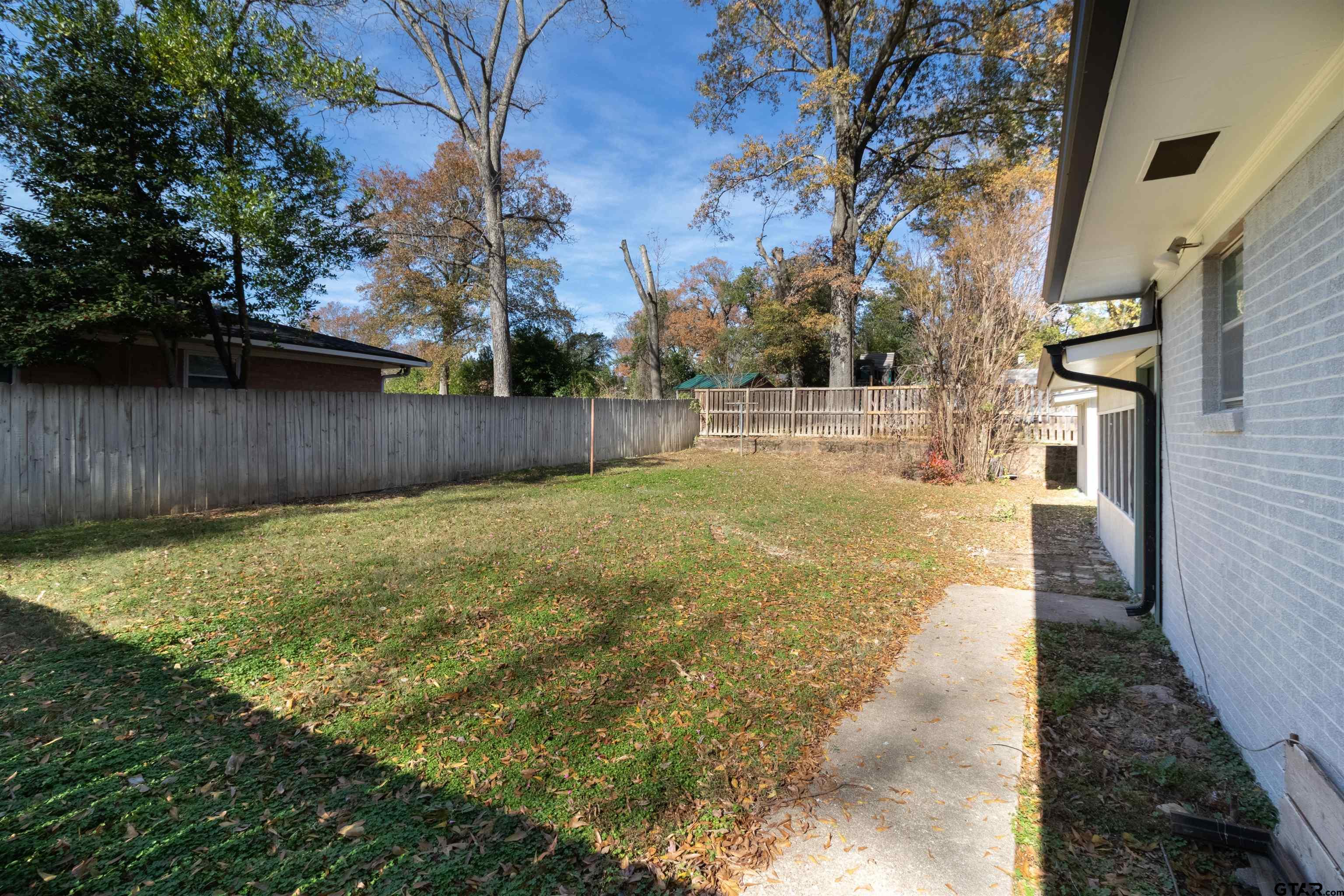 2419 Pounds Avenue Tyler, TX 75701 - Photo 40 of 48 a view of yard with swimming pool and sitting area