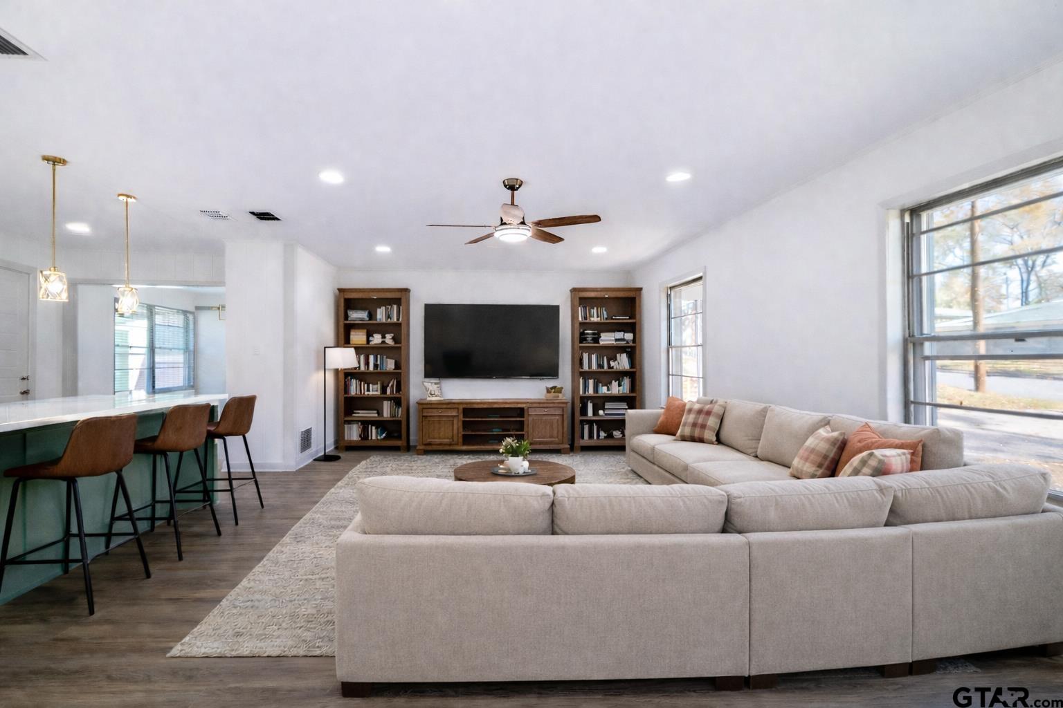 2419 Pounds Avenue Tyler, TX 75701 - Photo 10 of 48 a living room with furniture and a flat screen tv