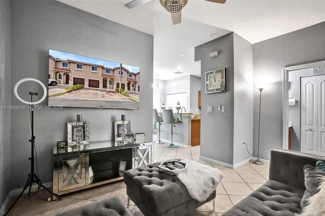 a bedroom with furniture and a wooden floor