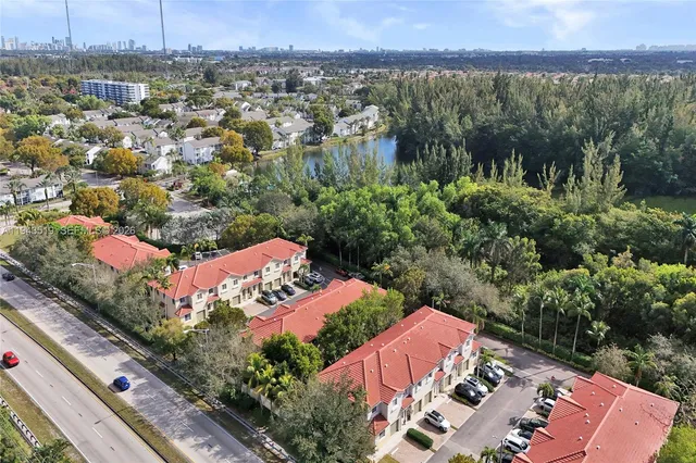 an aerial view of a house with a garden