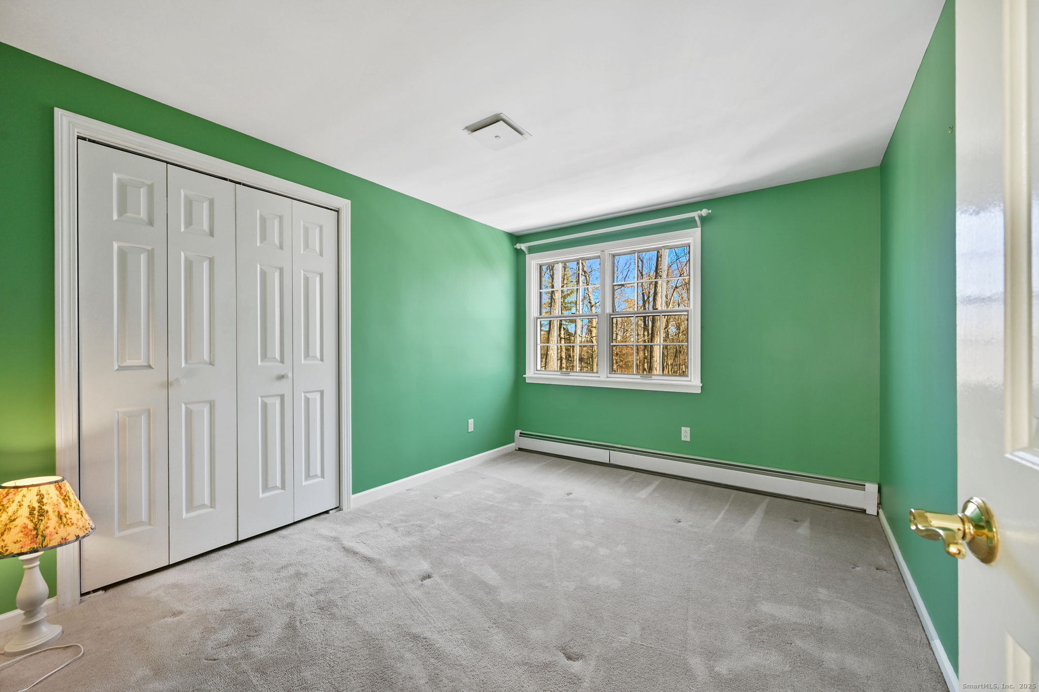 269 Thunder Lake Road Wilton, CT 06897 - Photo 16 of 26 an empty room with windows