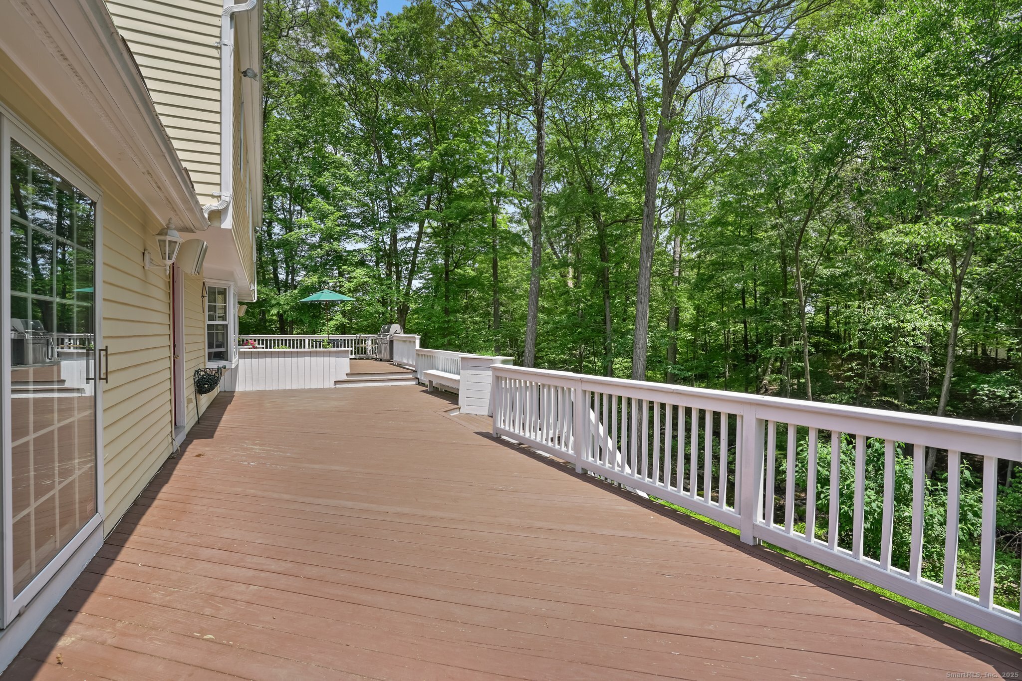 269 Thunder Lake Road Wilton, CT 06897 - Photo 20 of 26 a view of a balcony with yard