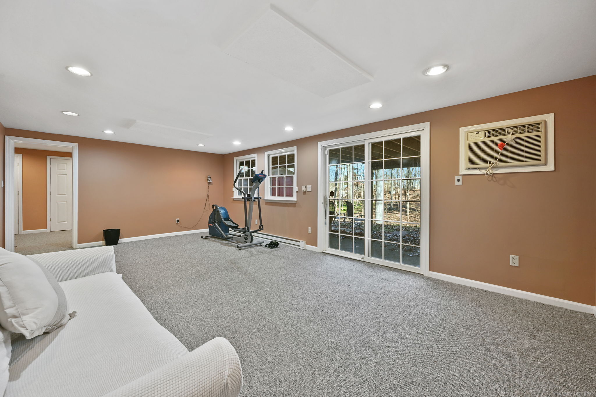 269 Thunder Lake Road Wilton, CT 06897 - Photo 22 of 26 a living room with furniture and a window