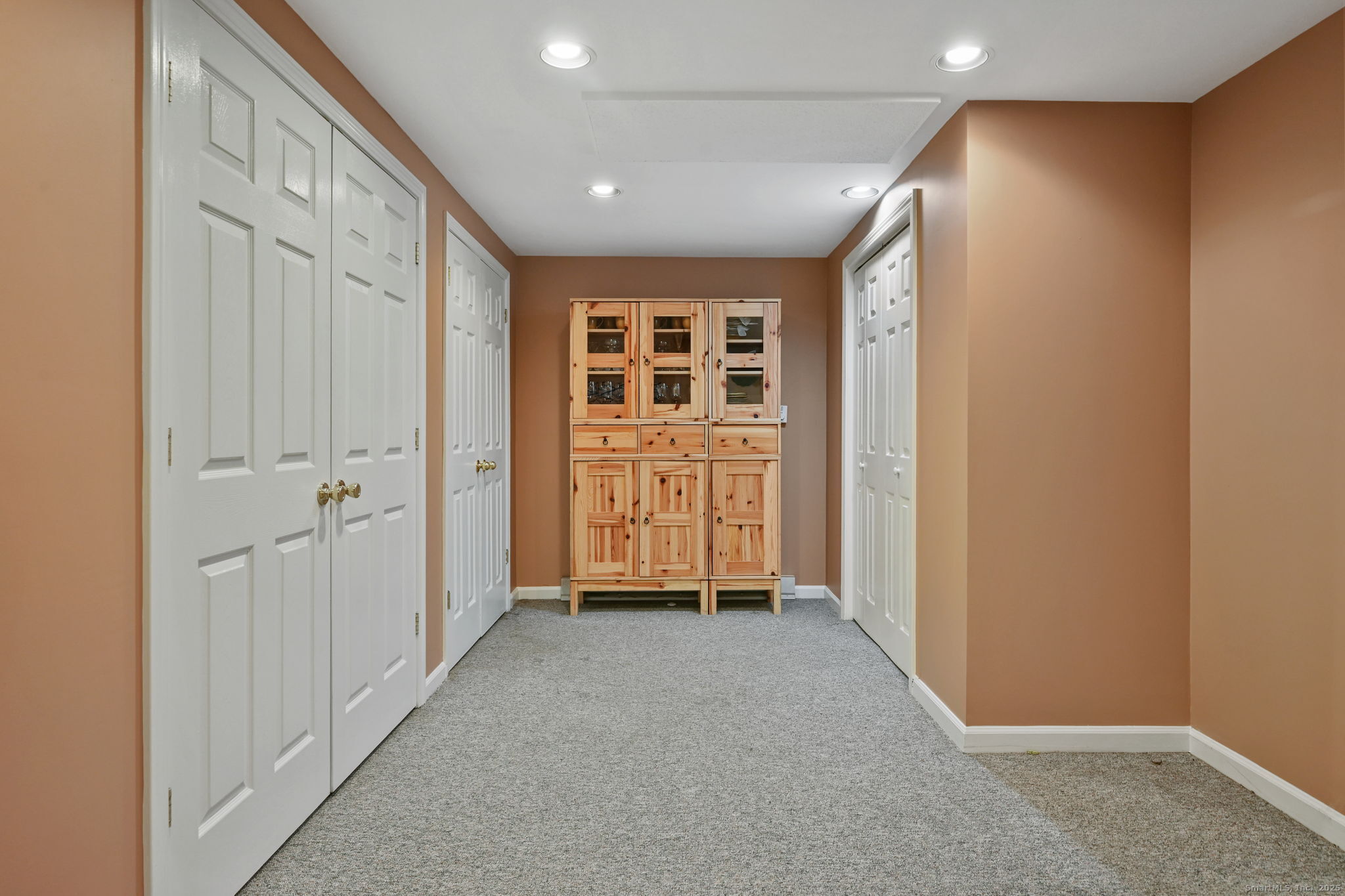269 Thunder Lake Road Wilton, CT 06897 - Photo 23 of 26 an empty room with windows