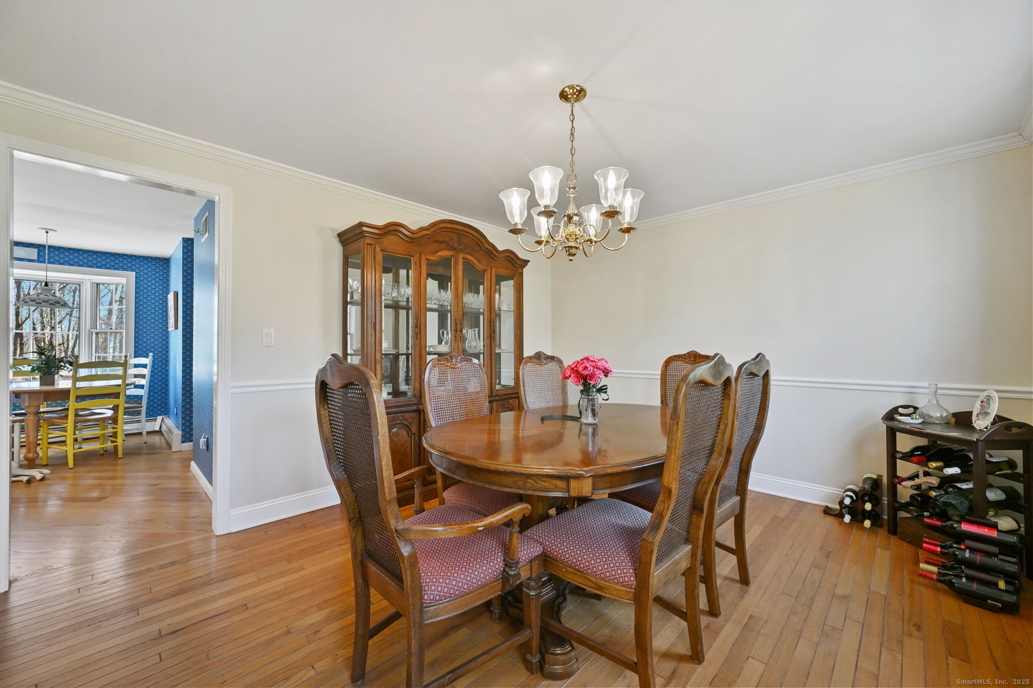 269 Thunder Lake Road Wilton, CT 06897 - Photo 5 of 26 a dining room with furniture and wooden floor