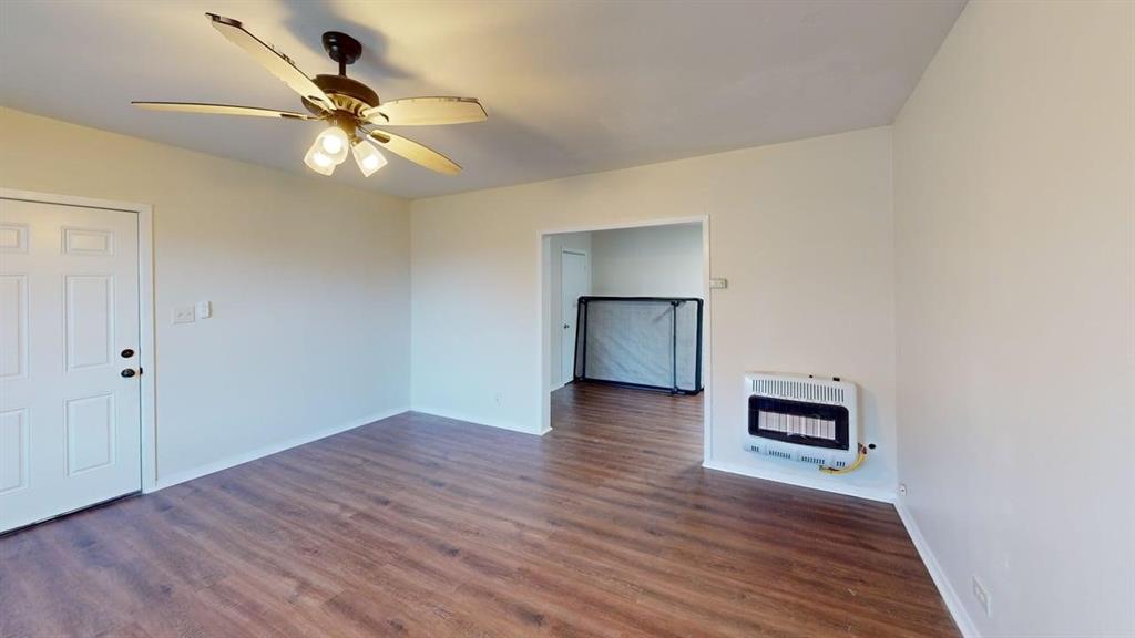 224 West Hull Street, Unit B Denison, TX 75020 - Photo 5 of 13 a view of empty room with wooden floor