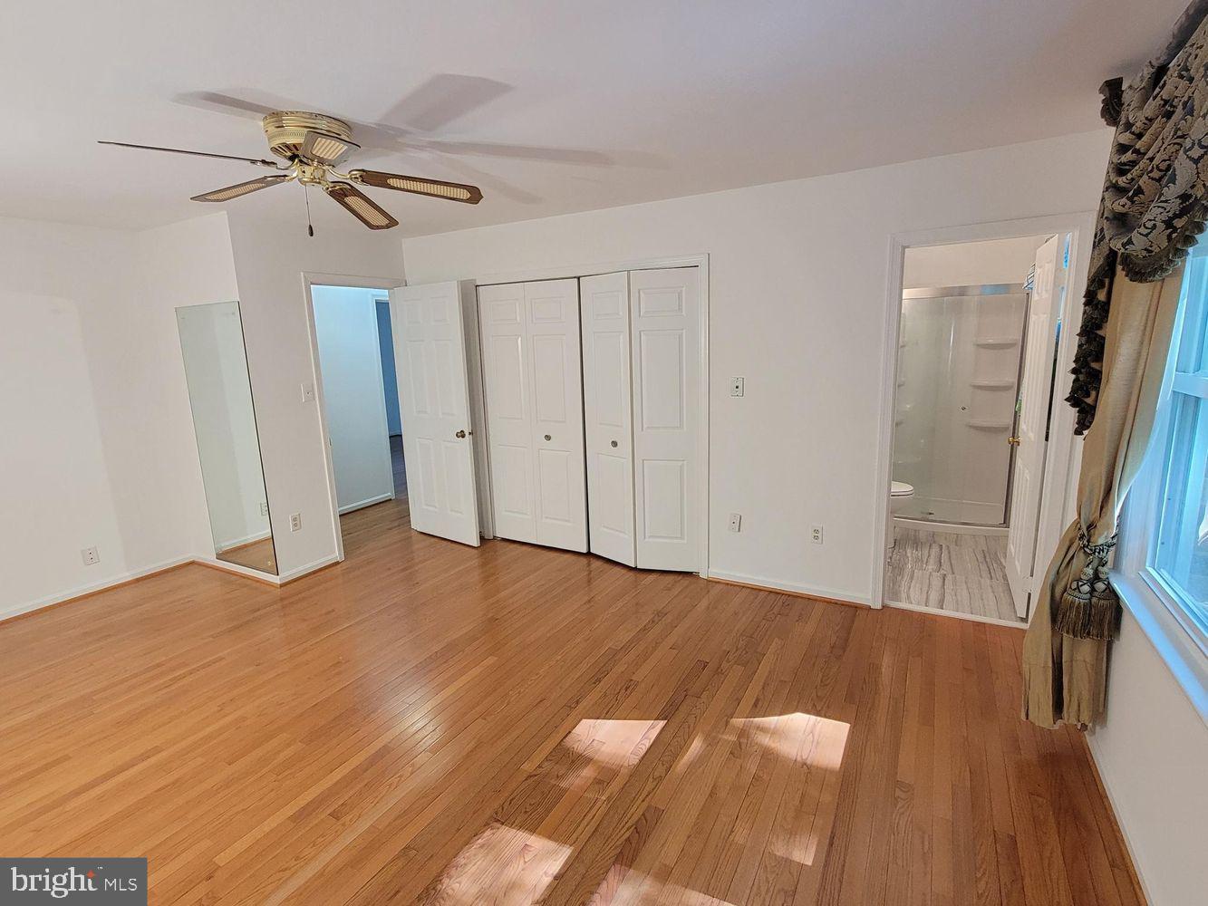 6684 Old Blacksmith Drive Burke, VA 22015 - Photo 10 of 26 a view of a room with wooden floor
