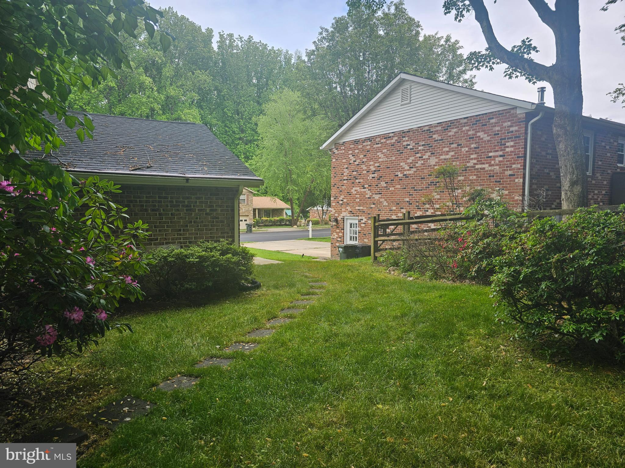 6684 Old Blacksmith Drive Burke, VA 22015 - Photo 24 of 26 a view of house with backyard