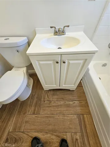 a bathroom with a sink and a toilet