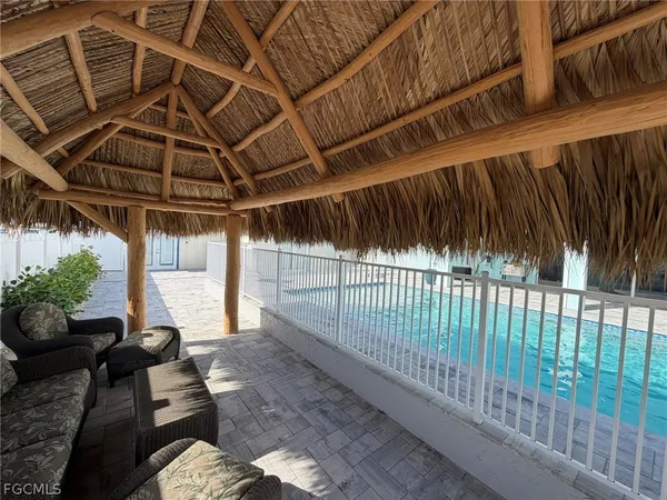 a view of a porch with furniture