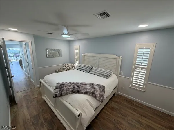 a spacious bathroom with a double vanity sink mirror and