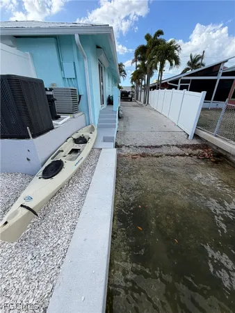 a view of a car in the back yard