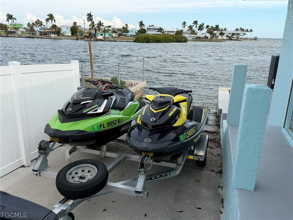 4743 Pine Island Road Matlacha, FL 33993 - Photo 25 of 34 a view of a car in the back yard