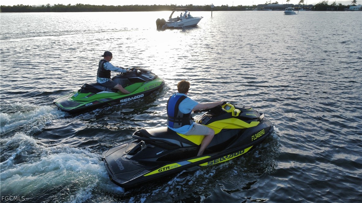 4743 Pine Island Road Matlacha, FL 33993 - Photo 26 of 34 a view of a lake with sitting area